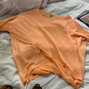 Cute top with a cross design in the front